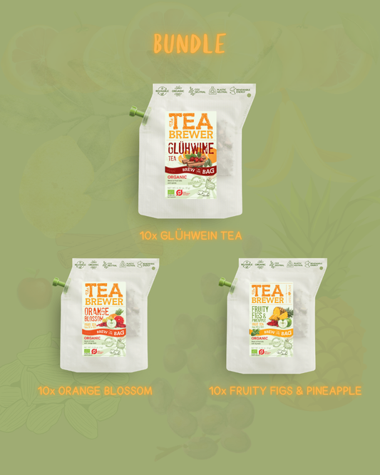 Brew Blend Teabrewer Bundle featuring three tea varieties: Glühwein, Orange Blossom, and Fruity Fresh, with vibrant packaging